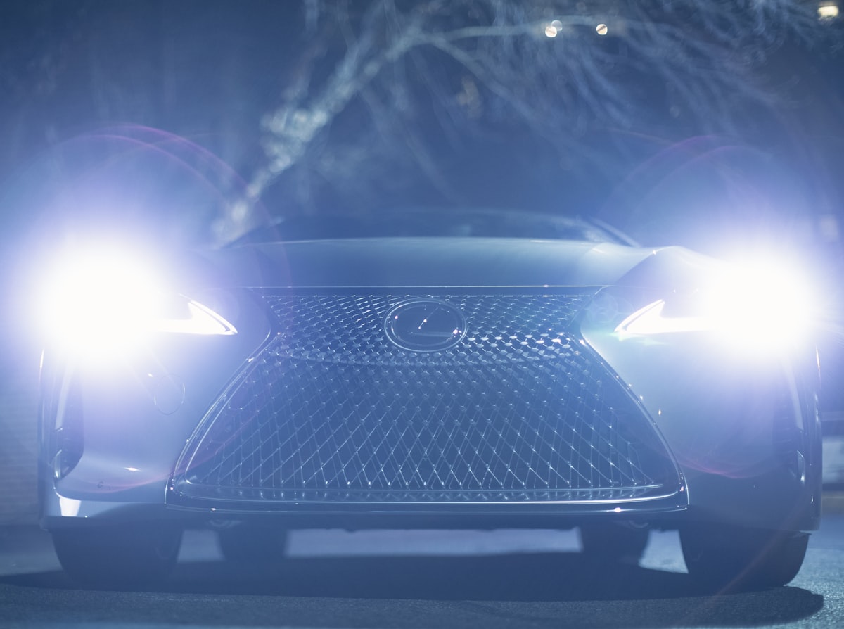 Car interior lit with ambient LED light at night