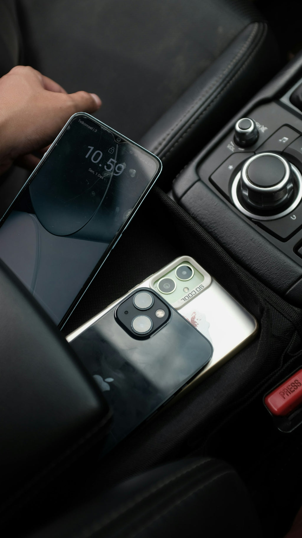 Smartphone mounted in car center console